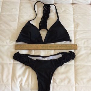 Black bikini with macramé details.   Size S